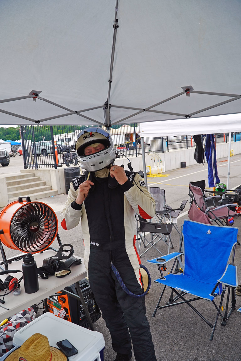 A Plan Z Motorsports driver suited up and ready to race