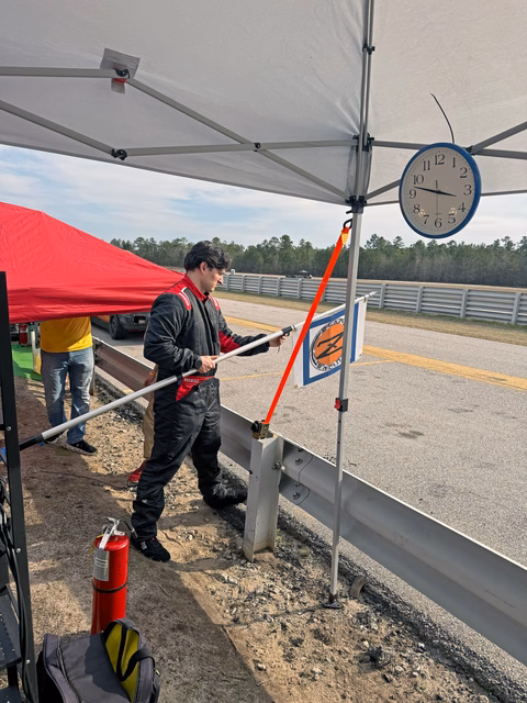 The Plan Z Motorsports pit crew at work during a race
